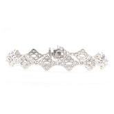 Sterling silver semi mount tennis bracelet setting with oval halo design and white topaz accents, made to order.